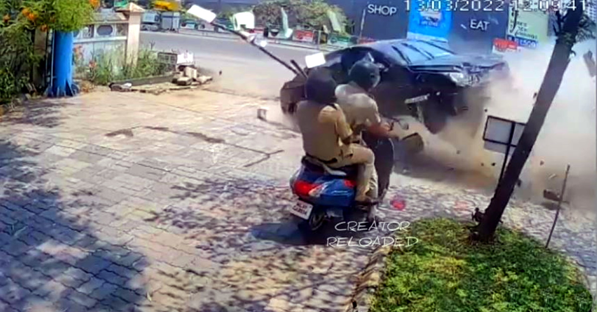 नियंत्रण से बाहर Chevrolet Cruze CCTV की दीवार से टकराया, दो पुलिसकर्मी बचे [वीडियो]